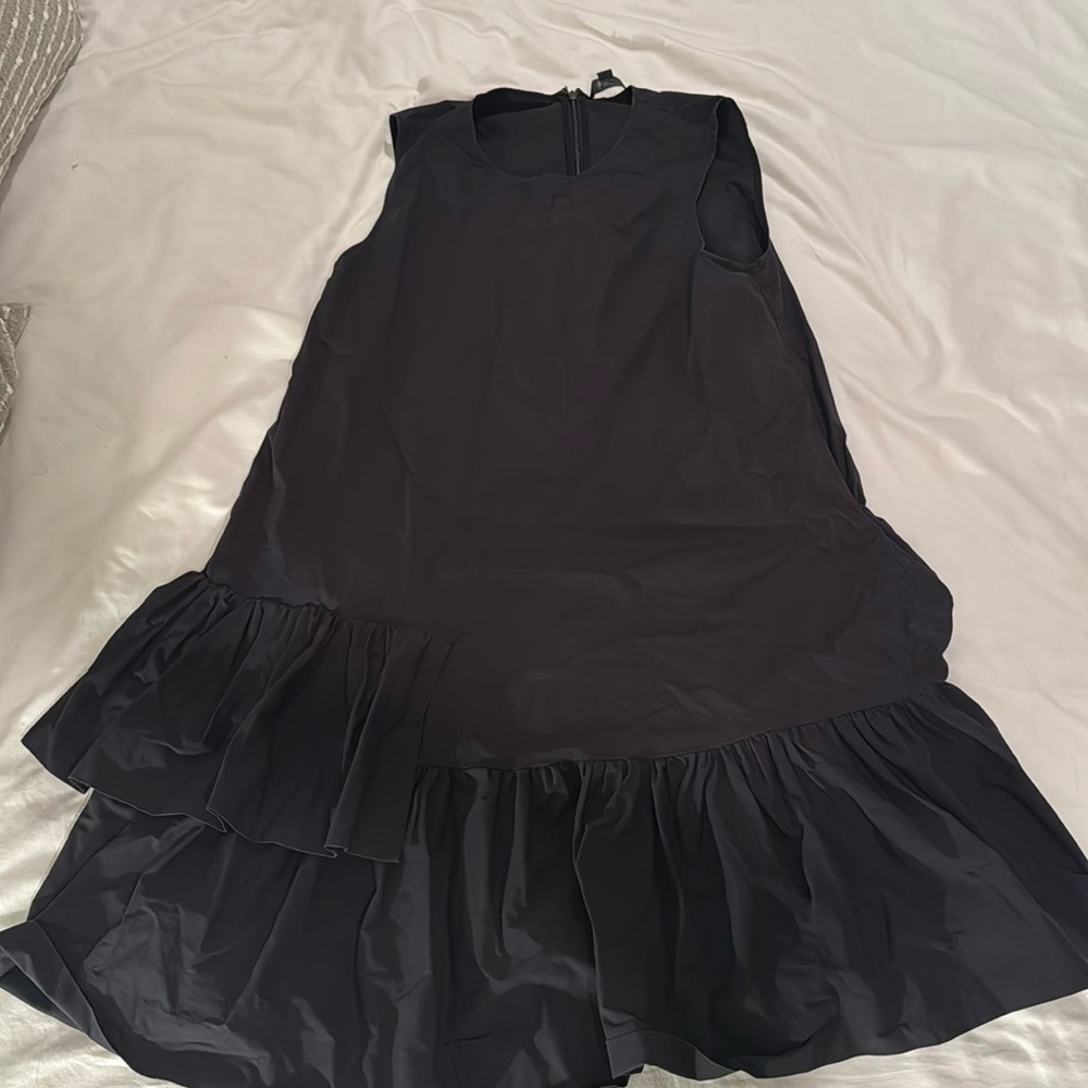 Black dress with asymmetrical ruffles
